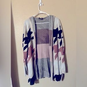 Pink cream and black sweater